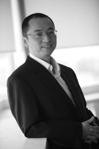 John Du sees upgrading from an electric bicycle to an econ-EV as similar to moving from a black and white to a color TV set.