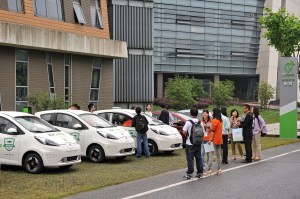 Jiaotong University students at an EV car sharing site. 